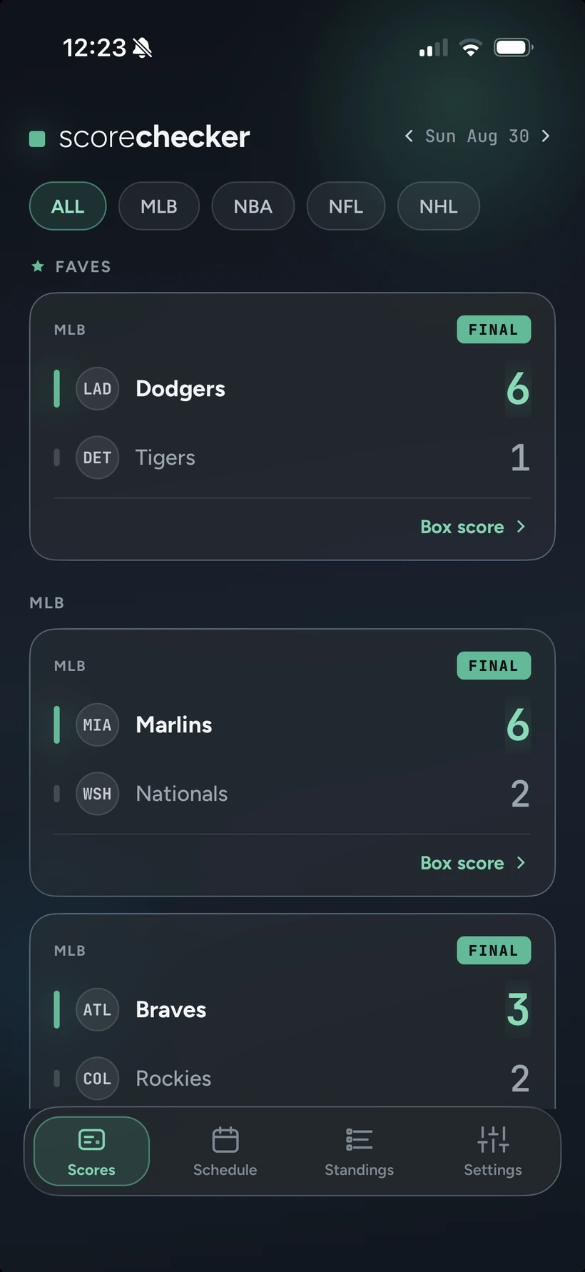 scorechecker's scores screen, listing today's NHL, NBA, MLB and NFL games with final scores, dark theme